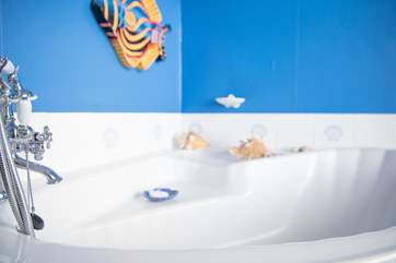 The family bathroom is situated on the ground floor, just off the kitchen