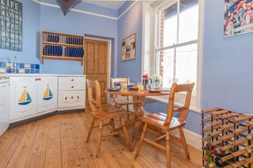 The kitchen/breakfast-room with doors leading out on to the balcony