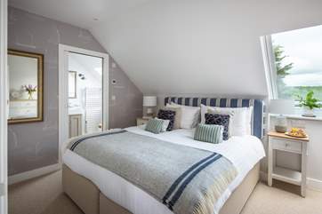 The bedroom on the first floor has an en suite shower-room (Bedroom 3).