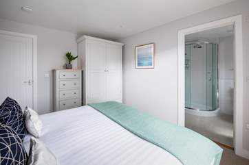 The master bedroom has an en suite shower-room.
