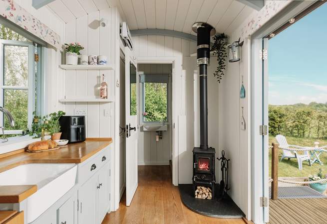 The ensuite shower room is to the right of the hut. 