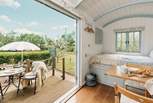 Open the French doors to welcome the outdoors in. 