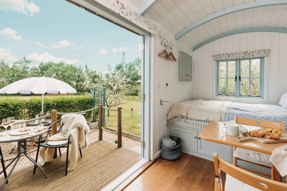 Open the French doors to welcome the outdoors in.
