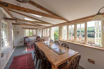 The fabulous conservatory overlooks the terrace, the garden and fields.