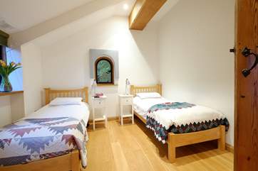 Bedroom 4 in The Sail Loft with twin beds.