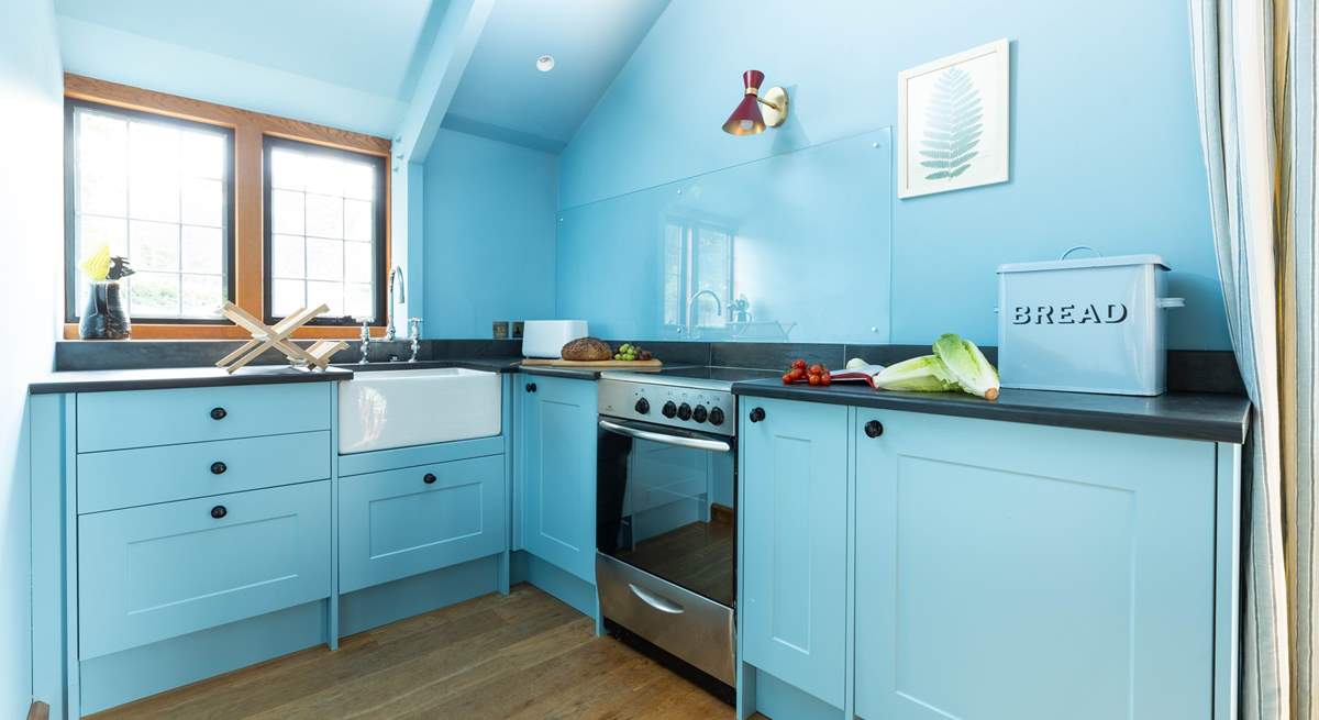 The kitchen-area in The Sail Loft. Please note the electric hob and oven has been disconnected and cannot be used, instead a microwave has been provided. 