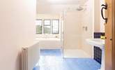 The family bathroom has a bath and large separate shower. - Thumbnail Image