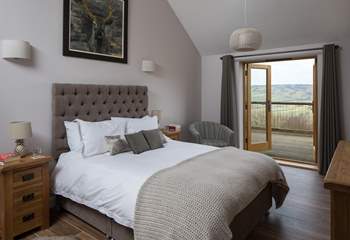 Bedroom 2 has a super comfy 5ft king-size bed and French doors that open onto the south-facing terrace.