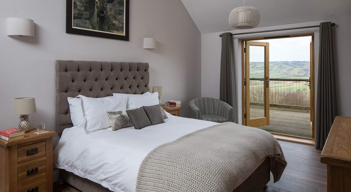 Bedroom 2 has a super comfy 5ft king-size bed and French doors that open onto the south-facing terrace.