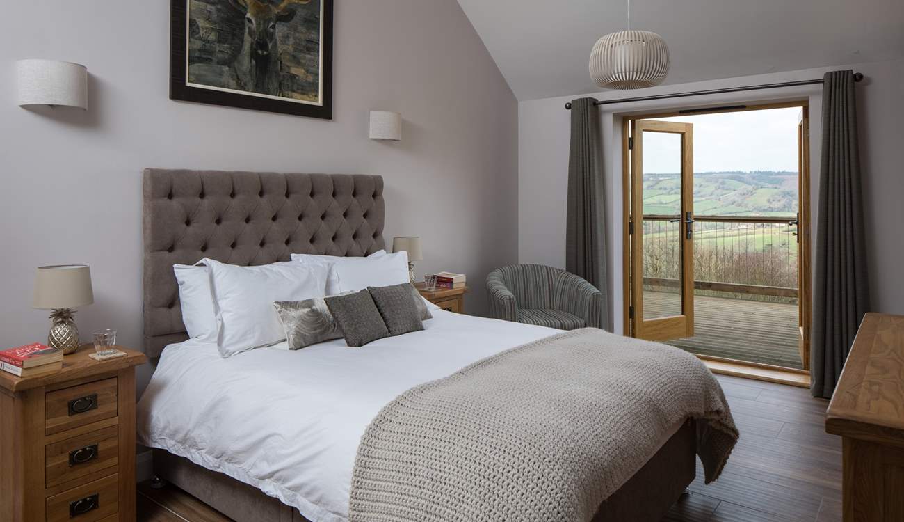 Bedroom 2 has a super comfy 5ft king-size bed and French doors that open onto the south-facing terrace.