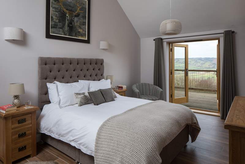Bedroom 2 has a super comfy 5ft king-size bed and French doors that open onto the south-facing terrace.