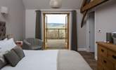 Bedroom 2 has a 5ft king-size bed and French doors onto the terrace. - Thumbnail Image