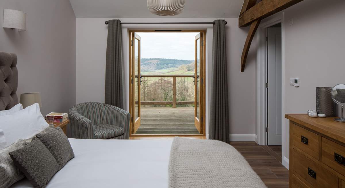 Bedroom 2 has a 5ft king-size bed and French doors onto the terrace.