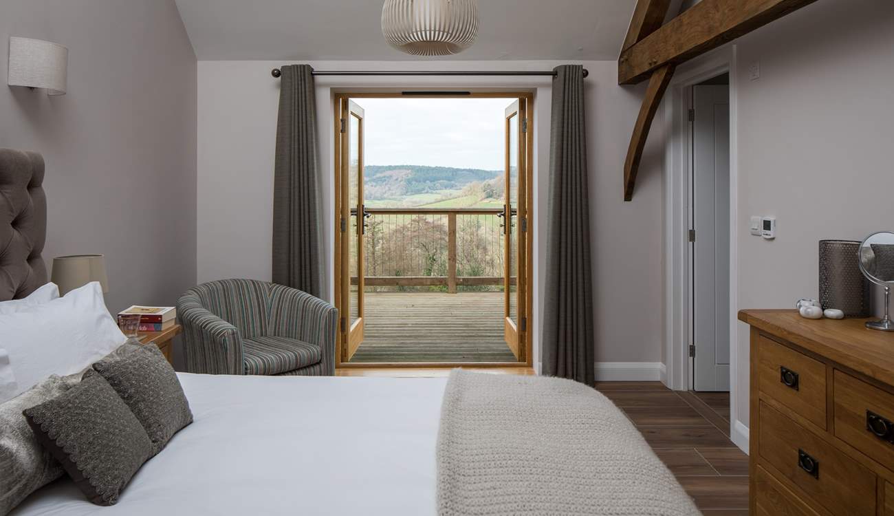 Bedroom 2 has a 5ft king-size bed and French doors onto the terrace.