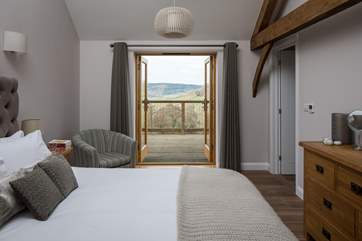 Bedroom 2 has a 5ft king-size bed and French doors onto the terrace.