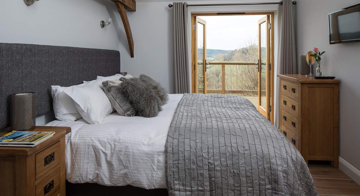 Bedroom 1 has a gorgeous 6ft 'zip and link' bed which can be split into two single 3ft beds and French doors leading onto the enclosed terrace.