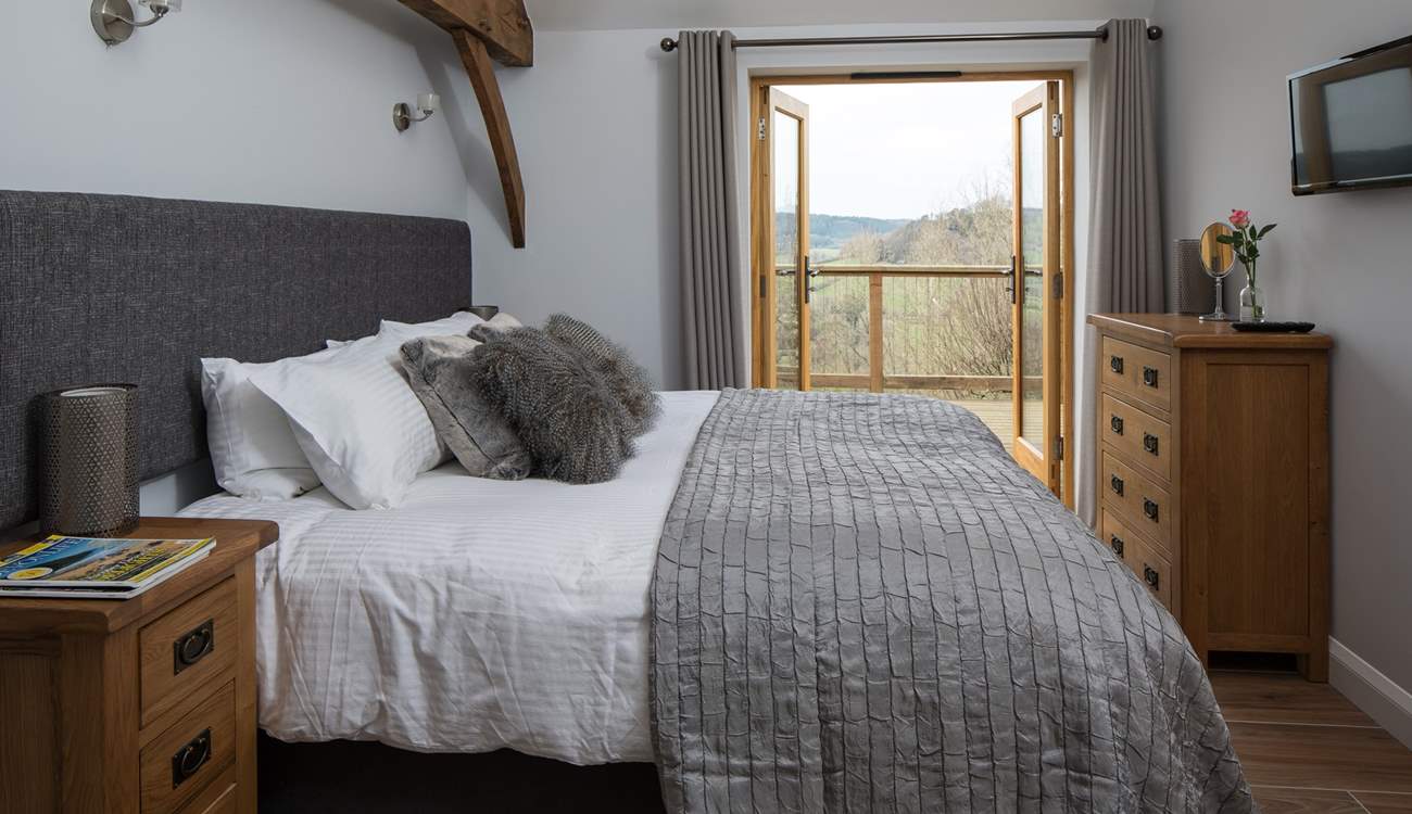 Bedroom 1 has a gorgeous 6ft 'zip and link' bed which can be split into two single 3ft beds and French doors leading onto the enclosed terrace.