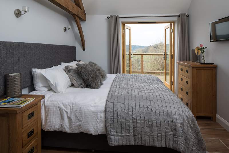 Bedroom 1 has a gorgeous 6ft 'zip and link' bed which can be split into two single 3ft beds and French doors leading onto the enclosed terrace.