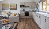 The stylish kitchen-area is spacious and very well-equipped. - Thumbnail Image