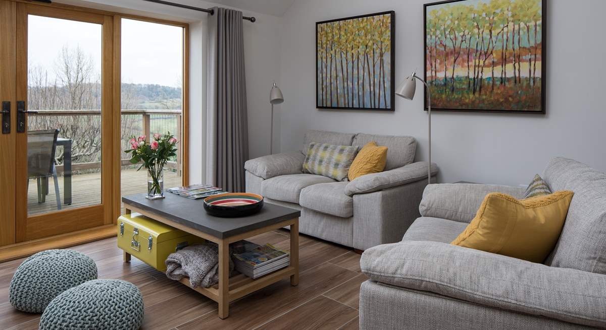 From the comfort of your sofa, you can admire the far reaching views across the valley.