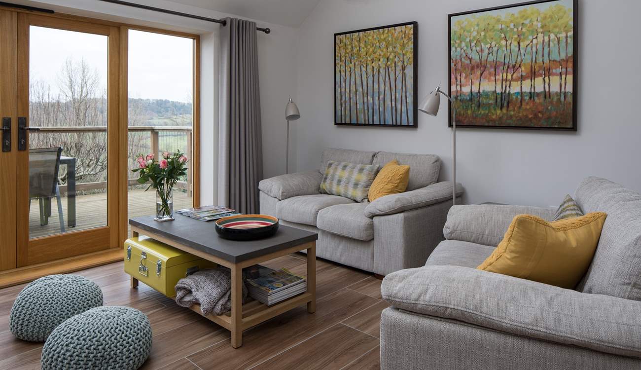 From the comfort of your sofa, you can admire the far reaching views across the valley.