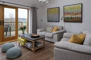 From the comfort of your sofa, you can admire the far reaching views across the valley.