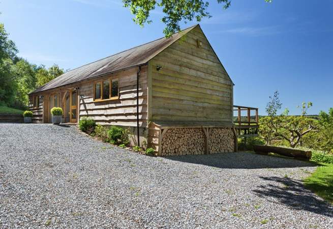 Larch Barn is detached with plenty of space for parking.