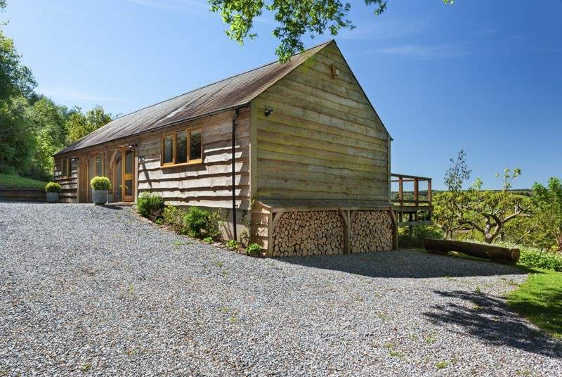 Larch Barn is detached with plenty of space for parking.