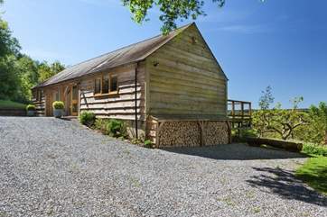 Larch Barn is detached with plenty of space for parking.