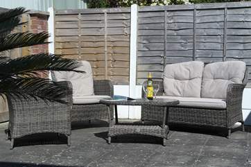 Access to the sunny terrace is through the rear patio doors.