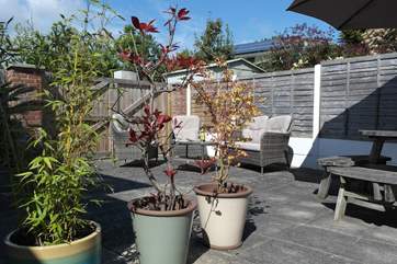 The bi-fold doors open out onto the patio.