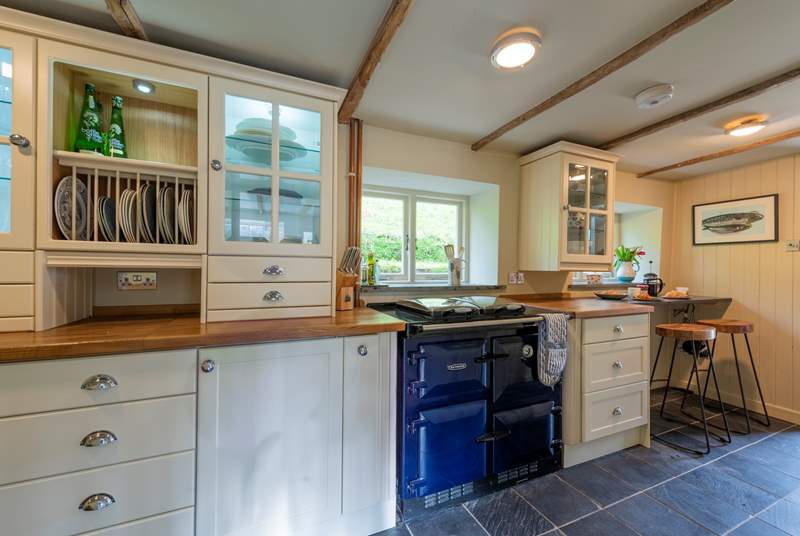 The country-style kitchen complete with Rayburn...