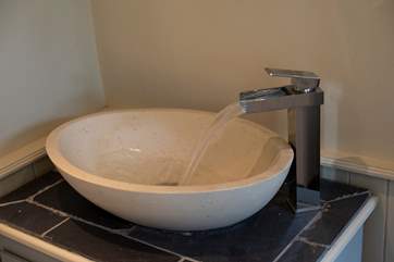 The stylish sink in the ground floor shower-room.