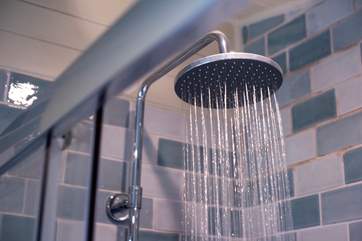 A super drench head shower in the ground floor shower-room.