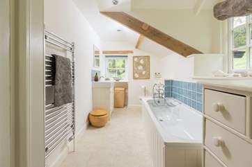 The family bathroom on the first floor (please mind the sloping ceiling).