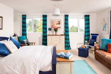 The master bedroom is flooded with natural light (Bedroom 1).