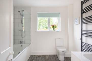The family bathroom on the first floor has a lovely tub for two.