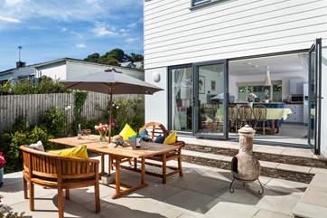 Light the fire and snuggle up on a summers evening (please note the bi-folds do not open all the way).