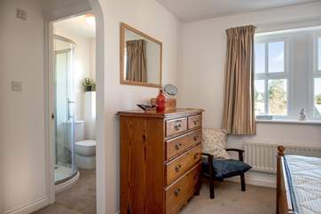 Bedroom 1 has an en suite shower-room.