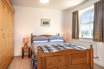 Bedroom 3 also has a double bed and looks over the back garden.