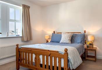 Bedroom 1, with a double bed, enjoys the views of Launceston Castle and majestic Dartmoor beyond.