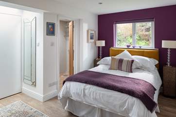 This fun bedroom has an en suite wet-room (Bedroom 2).