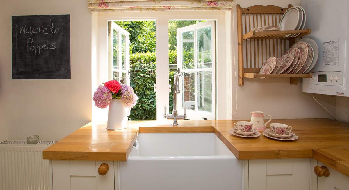 The kitchen has a gorgeous Belfast sink...