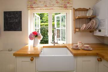 The kitchen has a gorgeous Belfast sink...