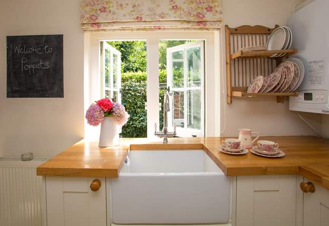 The kitchen has a gorgeous Belfast sink...