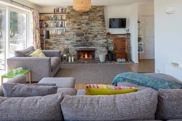 The living-room offers a fabulous space for the family to gather round on a chilly evening and enjoy the glow of the open fire. Simply perfect!