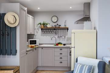 The well-equipped Shaker-style kitchen has everything you need to cook a wonderful meal whilst you are on holiday.