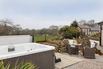 Looking back at Hettie's Barn towards the hot tub and patio area, leading off from the master bedroom.