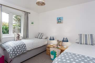 The neutral second bedroom can either be made up as two singles or a double.