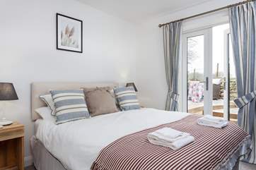 The cosy master bedroom is styled fabulously.